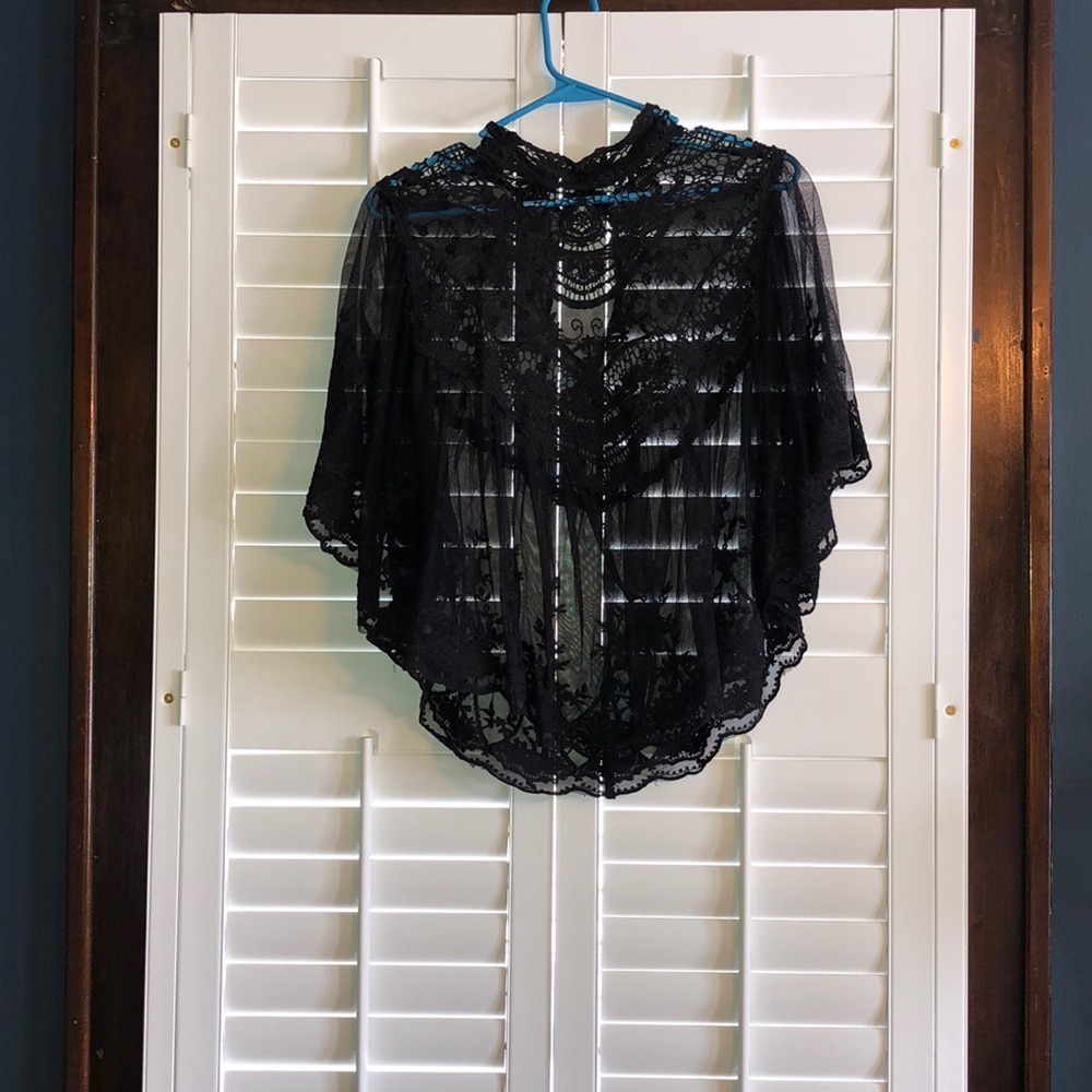 Beautifully embroidered black shawl.